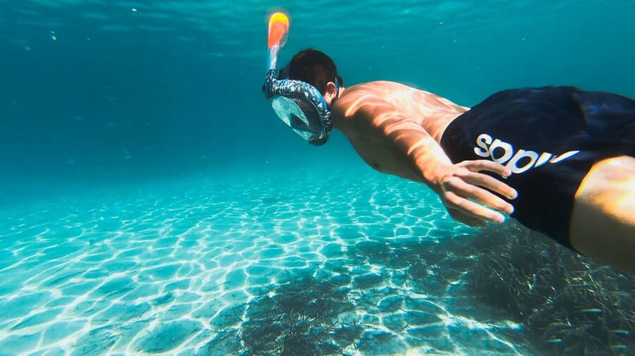 Golfo Aranci: Sunset Dolphin Kayak Tour with Aperitif - The first lesson and your kayak