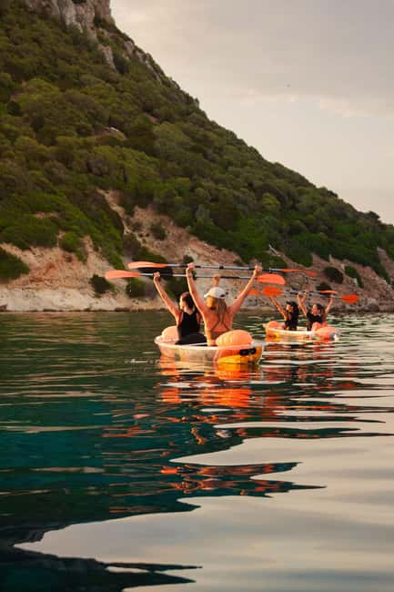 Golfo Aranci: traditional or transparent kayaks, dolphins, and aperitifs - Paddling past Cala Moresca and Figarolo