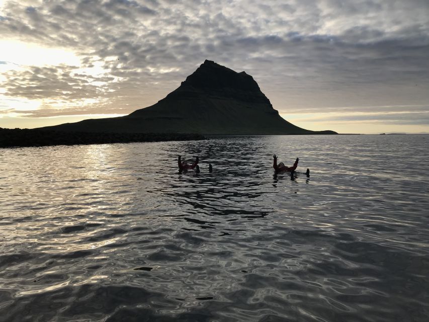 Grundarfjörður: Midnight Sun Kayaking Adventure - Returning to shore with a warm drink