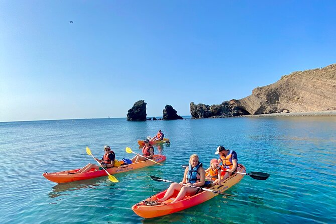 Guided sea kayak trip in Cap d’Agde - Paddling beside volcanic cliffs