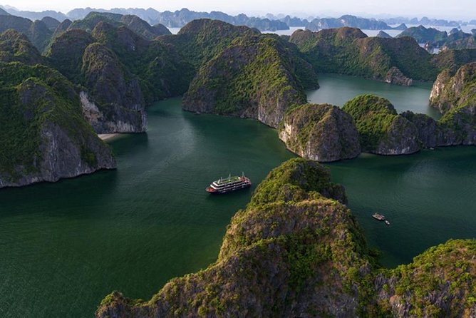 Halong Bay 2D1N BEST CRUISES All-Inclusive: Transfer, Meals, Kayak, Cave, Island - Day one: limestone islands, Titop Island, and Sung Sot Cave