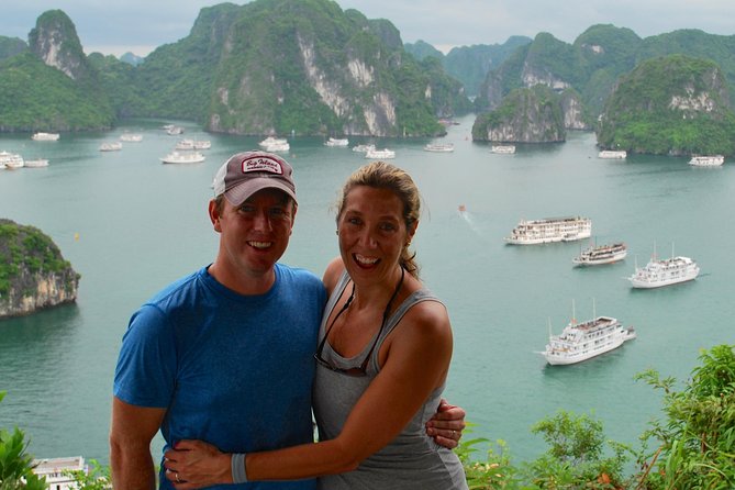 Halong Bay Day Tour: Visit Cave Island Kayaking Swimming Lunch - Titop Island, swimming, and the 500-step climb