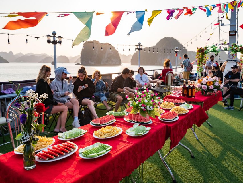 Hanoi: Halong Bay Day Trip with Titop Island, Cave, & Kayak - Sunset Wine and Fruit on the Return Cruise