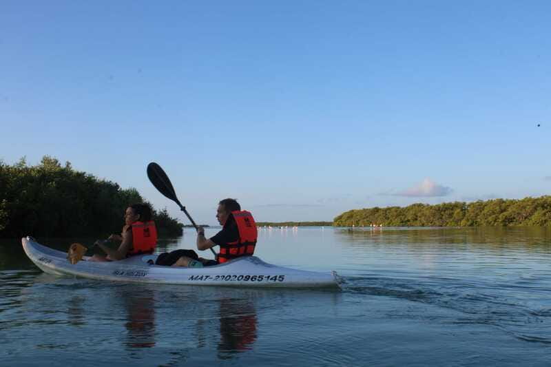 Holbox: Guided Sunrise/Sunset Kayak Tour by Mangrove Reserve - What to pack for a wet morning