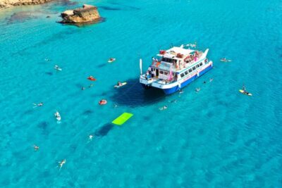 Beach Hopping Cruise w/ Paddleboard, Food, & Drinks