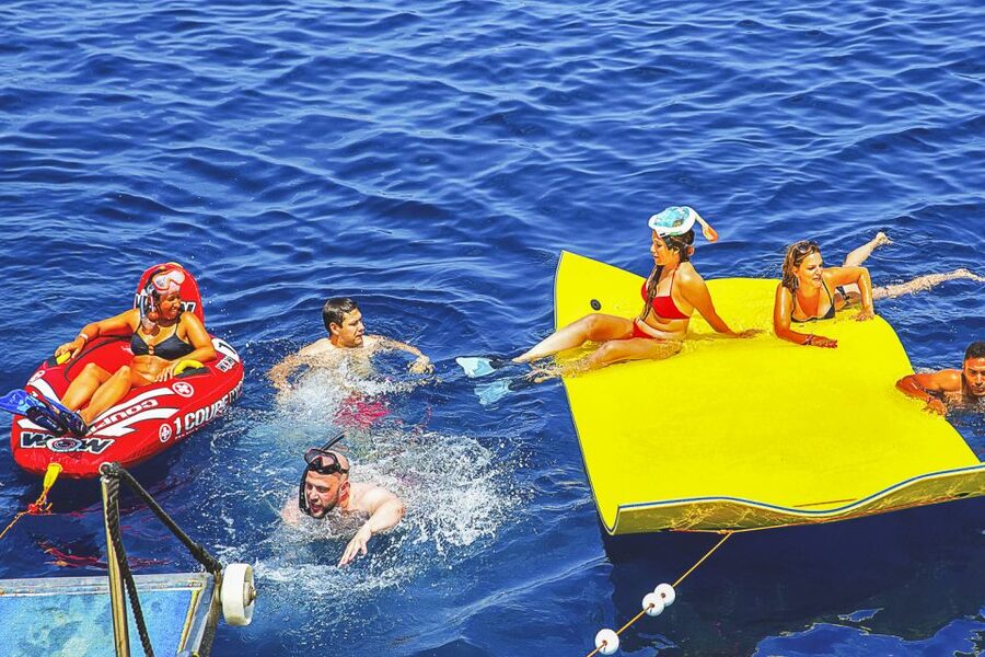 Ibiza: Beach Hopping Cruise w/ Paddleboard, Food, & Drinks - Cala Comte and the western views
