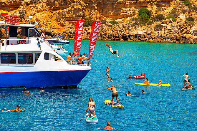 Ibiza Beach Hopping Cruise with Paddleboards, Drinks and Food 6h - Six hours along Ibiza’s western coast