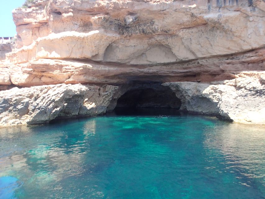 Ibiza: Snorkeling and SUP Paddle, Beach and Cave Tour - Cala Bassa: rocky seabed and clear water