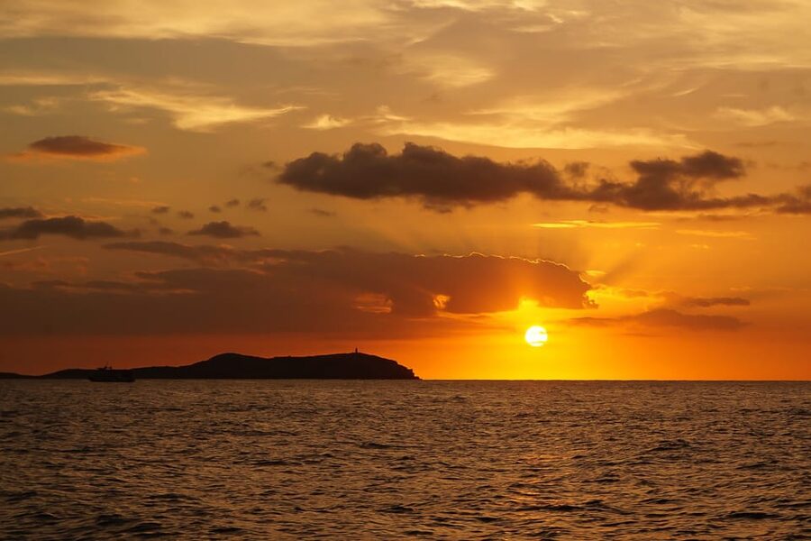 Ibiza: Sunset Boat Trip with Snorkeling, Kayaking, & Drinks - The western coast in a three-hour window