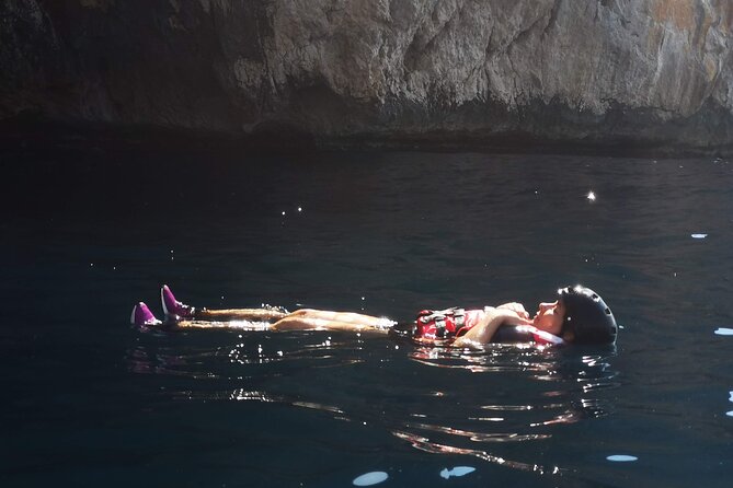 Kayak excursion to Cova dels Coloms from Platja Mascarat - The jump, the water, and getting back in