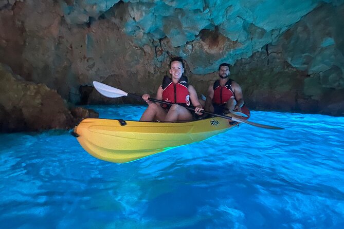 Kayak route through Cala Granadella - Exploring the Llop Marí Cave by kayak