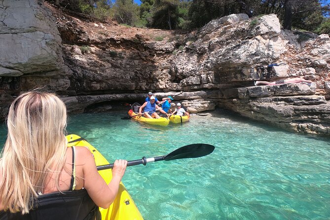 Kayaking to Island Saint Jerolim with snorkeling activitie - Walking the island beyond the shoreline