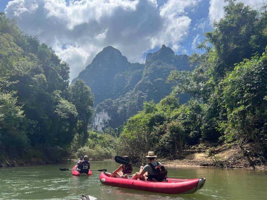 Khao Lak: Full-Day Khao Sok Jungle Walk and Canoeing Tour - Canoeing the Sok River below limestone cliffs