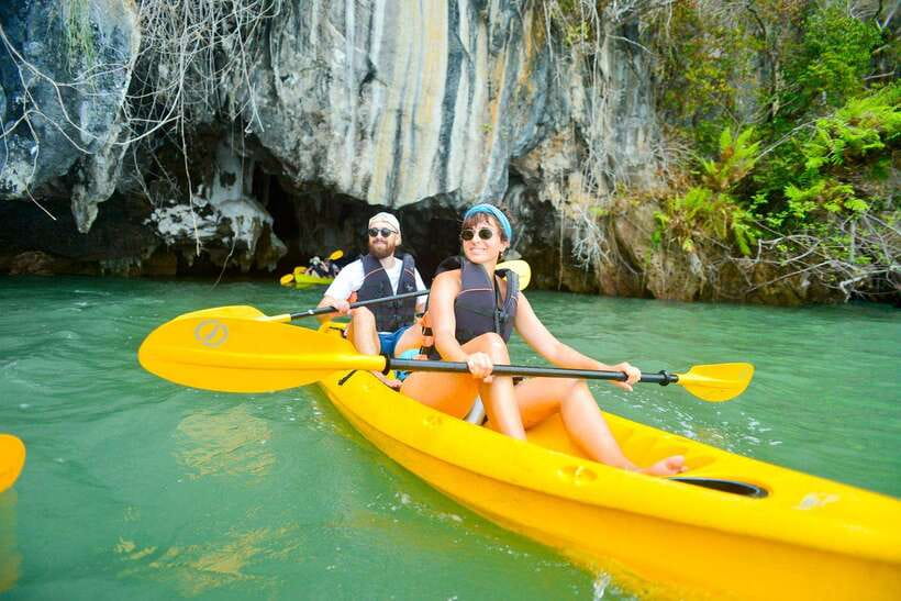 Ko Lanta: Full-Day Mangrove and Sea Cave Kayaking Experience - Longtail boats connect the islands