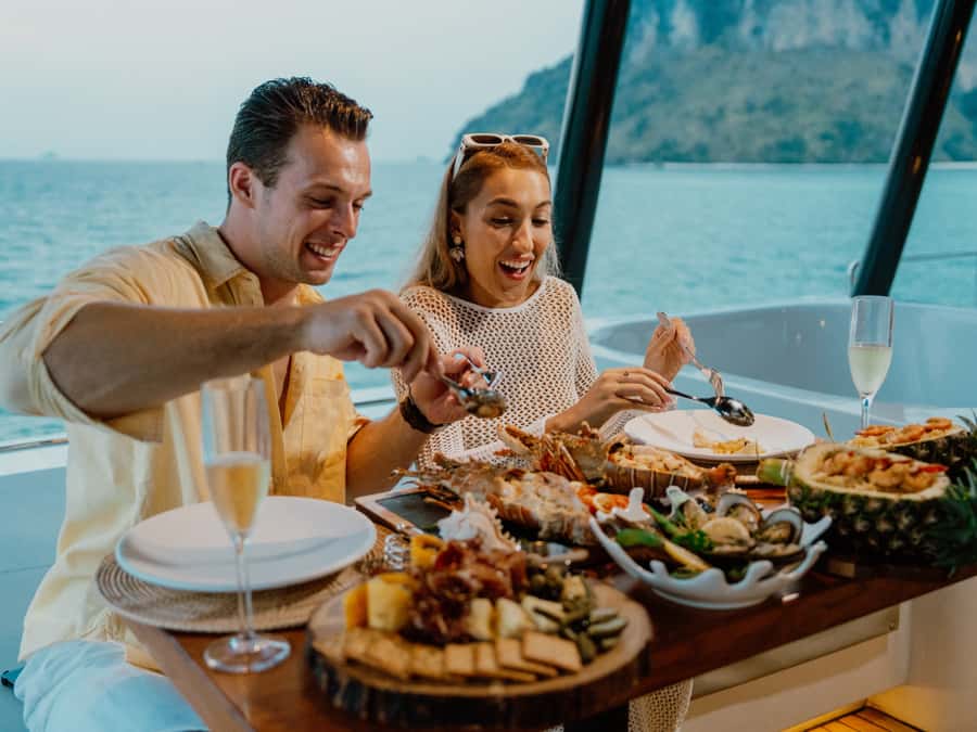 Krabi: 4 Island Premium Yacht with Snorkeling & Clear Kayak - Sunset, crib netting, and the dinner set