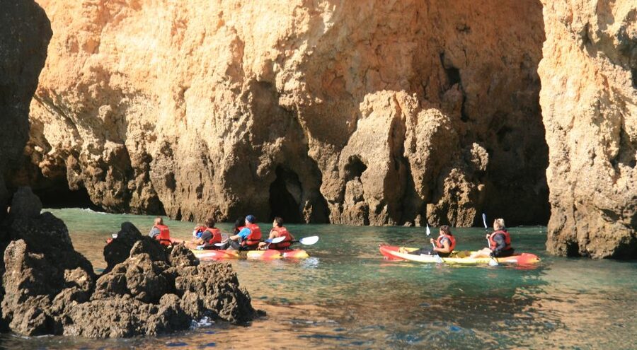Lagos: Kayaking Tour - Returning to the catamaran for a swim