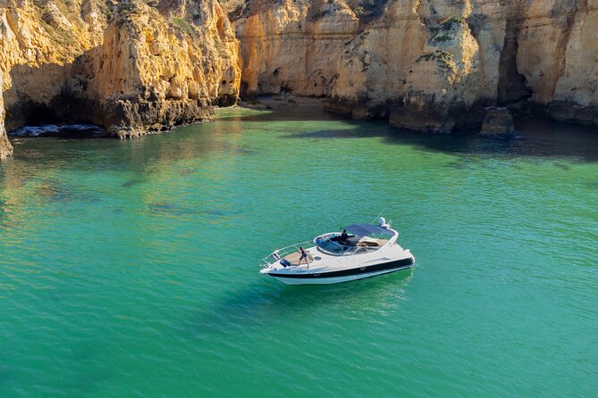 Lagos Private Boat Trip with Drinks, Snacks, Paddleboards Kayak - Swimming, snorkeling, paddleboards, and a kayak