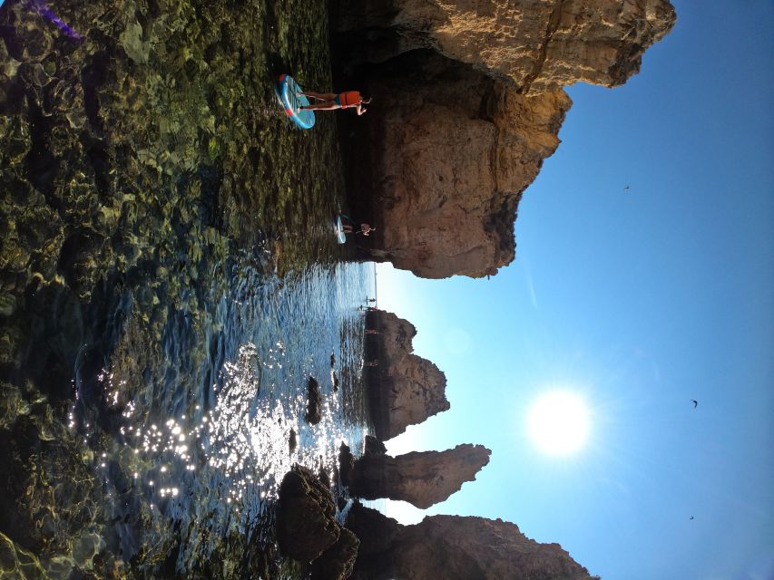 Lagos SUP Caves&Grottoes Tour at Sunrise, Ponta da Piedade - From D. Ana Beach into the Algarve’s rock arches