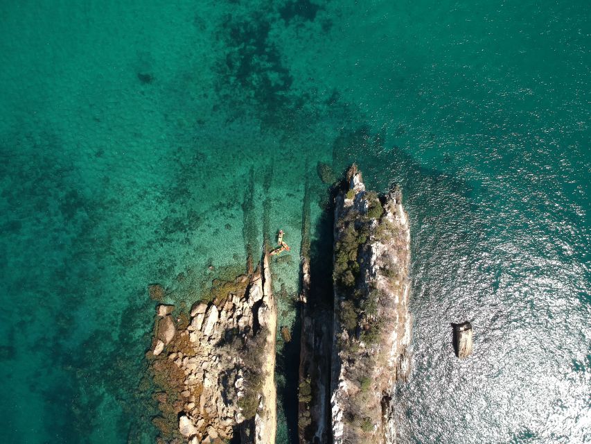 Lisbon: Kayaking and Snorkeling Adventure - Kayaking through limestone caves