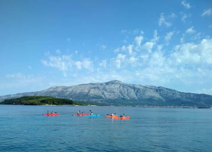 Lumbarda - Sunset Kayak Tour with a Picnic - Wine and Sweets - Paddling across clear Dalmatian water