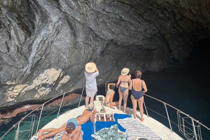 Mallorca Beach & Caves 4hr Boat Trip Drinks, Tapas, SUP & Snorkel - Cliff views and caves before the first swim