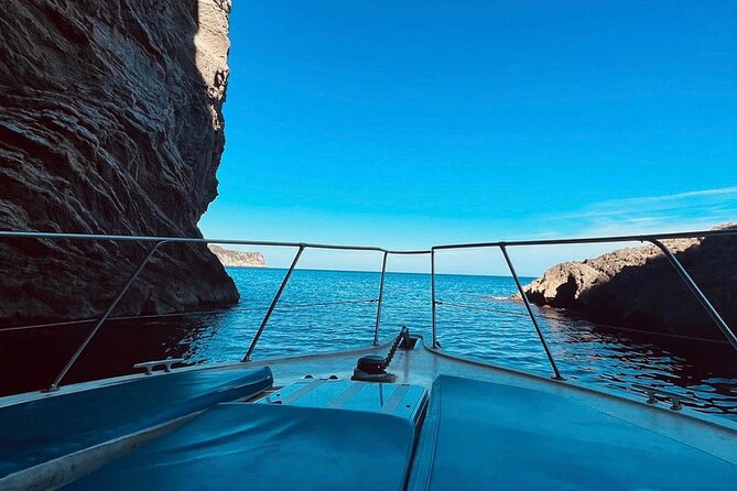 Mallorca Beach & Caves 4hr Boat Trip Drinks, Tapas, SUP & Snorkel - Alcanada Lighthouse and the final water stop
