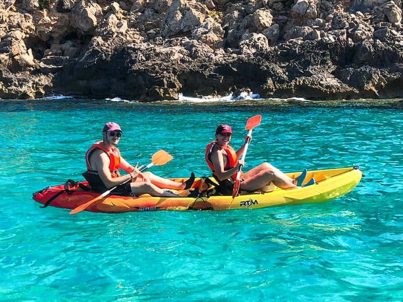Mallorca: Sea Caves Kayaking Tour, Snorkeling & Snack - Following the cliffs toward the first caves