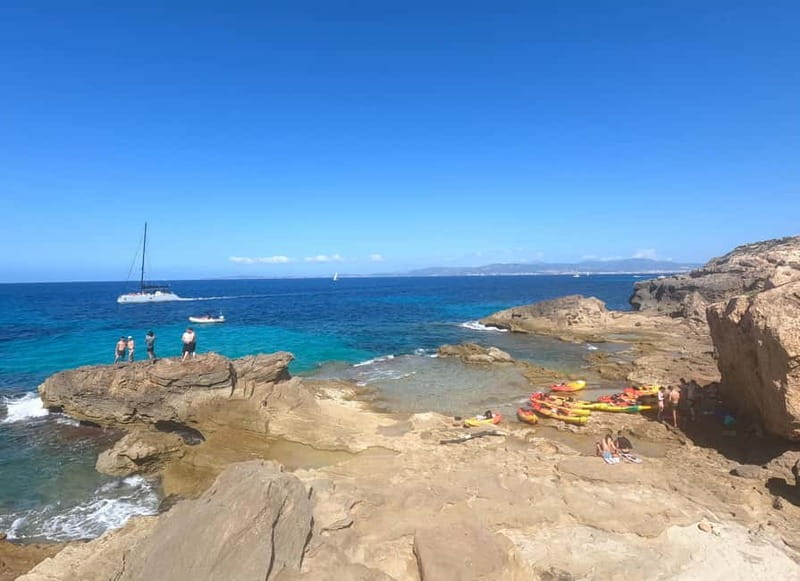 Mallorca: Sea Caves Kayaking Tour, Snorkeling & Snack - Swimming and snorkeling in clear water