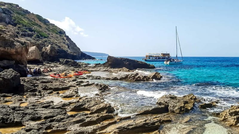 Mallorca: Sea Caves Kayaking Tour, Snorkeling & Snack - Photographs, guides, and the motorboat