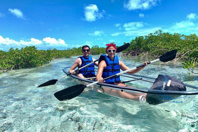 Mangrove & Iguana Clear Kayak Tour - Crossing to Mangrove Cay by tow