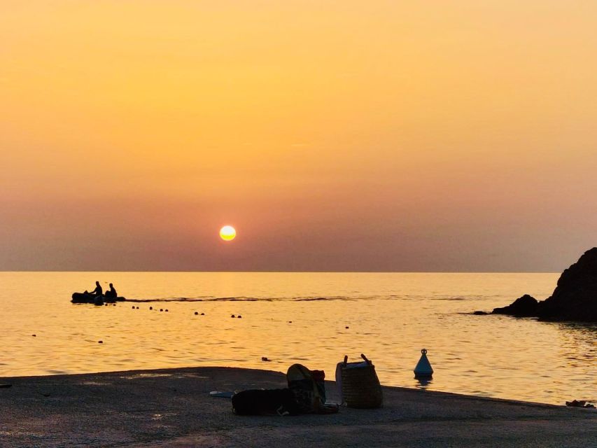 Marciana Marina: Evening Sea Kayaking Tour with Swim Stop - The return trip and Capraia sunset