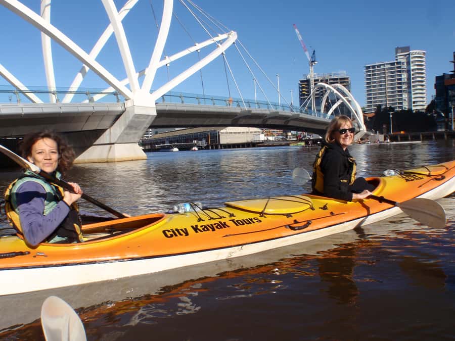 Melbourne: Iconic City Sights Kayak Experience - Passing Polly Woodside and heading toward Docklands