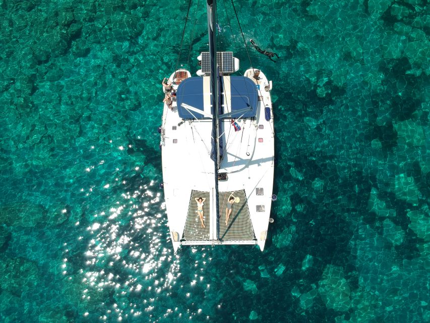Milos: Full-Day Catamaran Cruise with Paddle Board - Setting out from Adamas