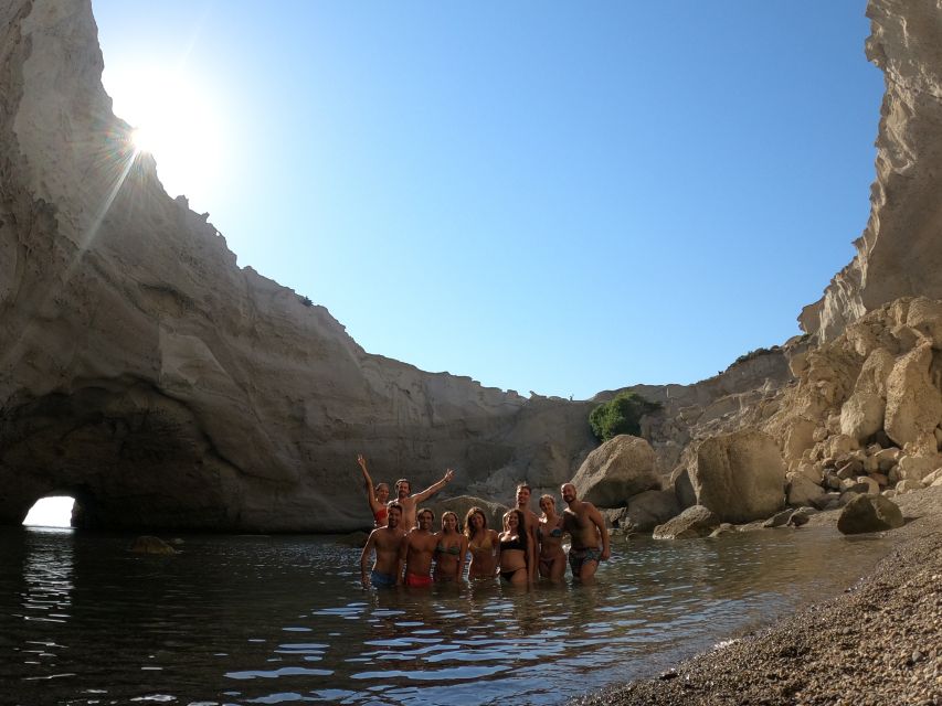 Milos: Full-Day Catamaran Cruise with Paddle Board - Entering Sykia Cave by dinghy