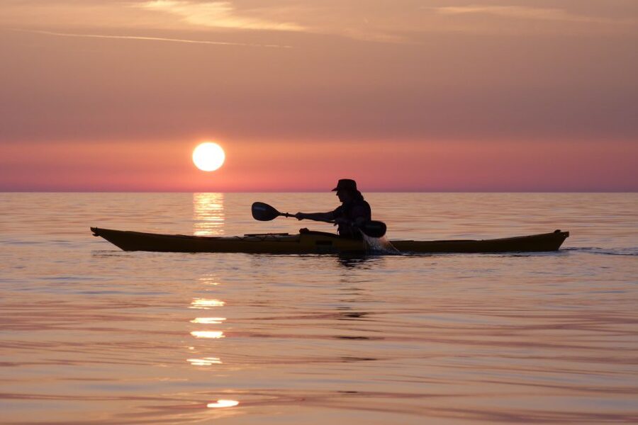 Milos: Sea Kayaking Trip at Sunset with Snack - The 19:30 swim, fruit, and cookie stop