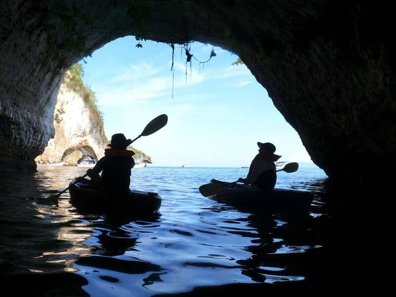 Mismaloya: Los Arcos Bioluminescent Waters Kayak & Cave Tour - Los Arcos caves, arches, and grottos