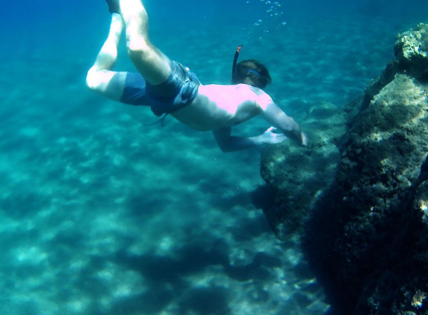 Naxos: Rhina Cave and Coastline Sea Kayaking Tour - Snorkeling in Blue-Green Water