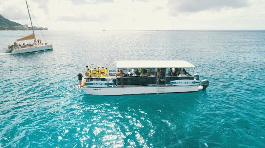 Oahu Snorkeling with Turtles, Water Scooter, Paddleboard - Trying the electric water scooter