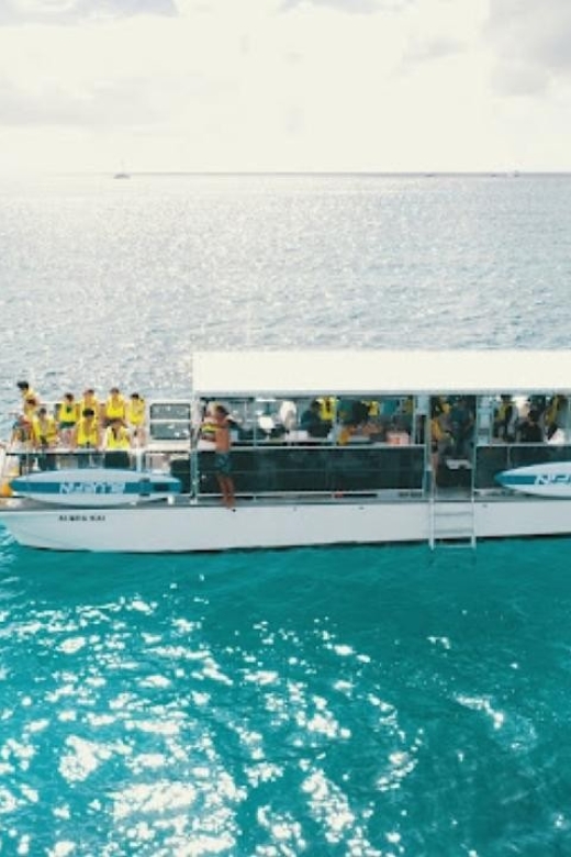Oahu Snorkeling with Turtles, Water Scooter, Paddleboard - Paddleboarding on the open water