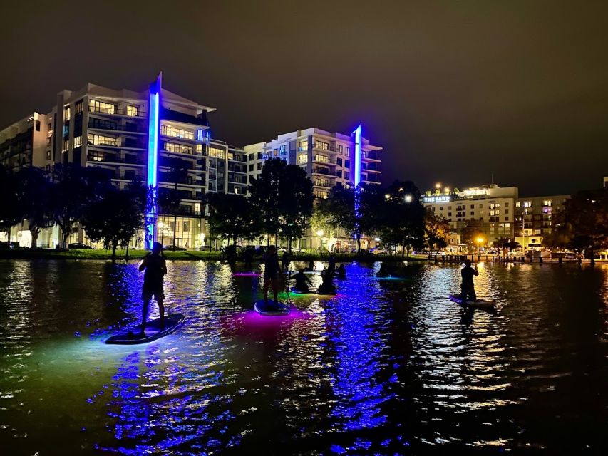 Orlando: LED Night Glow Clear Kayak or Paddleboard Tour - Passing the homes along Lake Ivanhoe