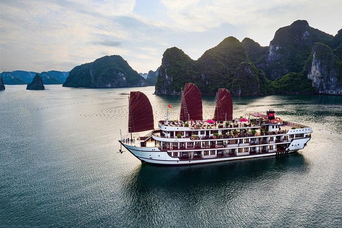 Overnight Luxury 5 Star Alisa Cruise with Meals, Kayak or Bamboo Boat - Day two: tai chi, breakfast, and Sung Sot Cave