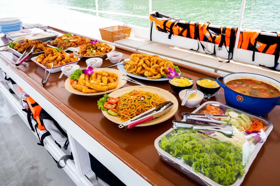 Phuket: James Bond Island and Canoeing Day Tour by Boat - A Thai buffet served on the boat