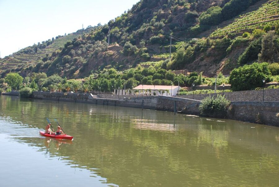 Pinhão: Douro Valley Rabelo Boat Tour and Kayak Experience - The one-hour ride toward the River Tua