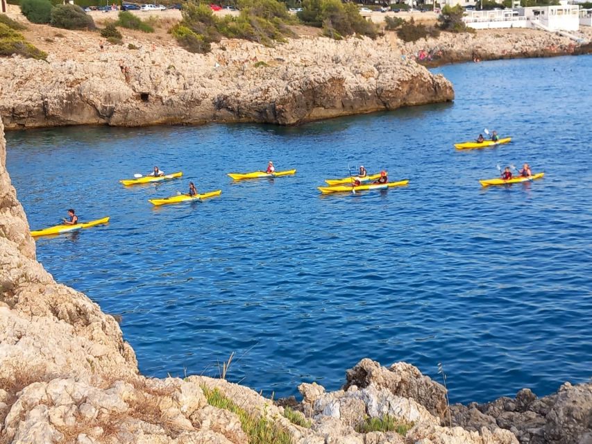 Porto Selvaggio kayak tour + cliff diving + cold springs - Paddling beneath S. Maria dell’Alto Tower
