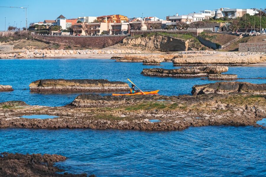 Porto Torres: Guided Kayaking Excursion - Paddling along the Porto Torres coast