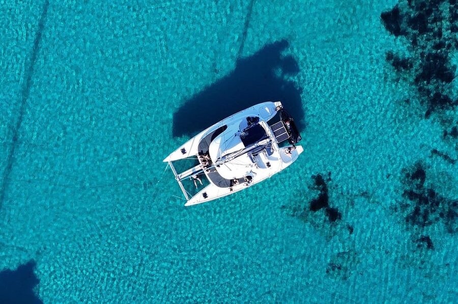 Private Catamaran Cruise Mykonos Delos with Meals & SUP - Leaving Mykonos by Catamaran