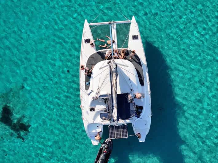 Private Catamaran Cruise Mykonos Delos with Meals & SUP - Rhenia’s Quiet Cove and Clear Water