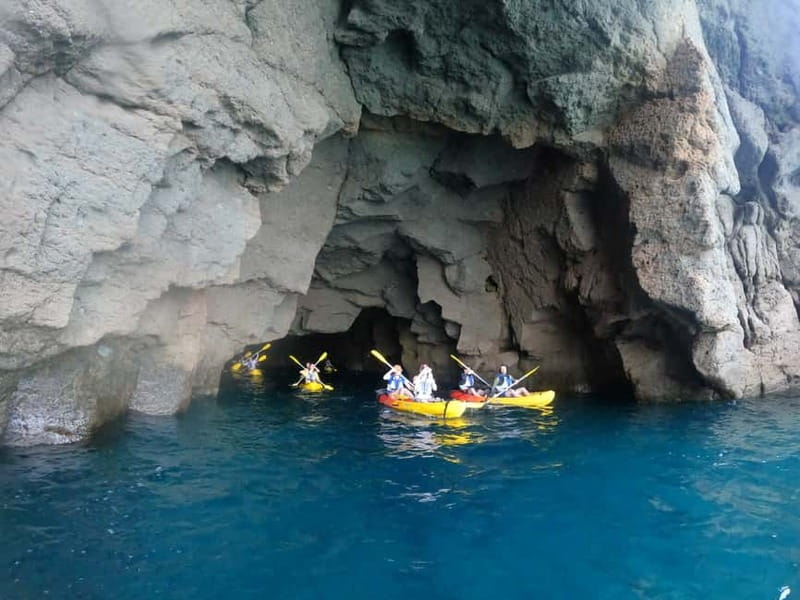 Puerto Mogán: Guided Adventure Kayak Tour in Caves & Snorkel - Paddling along the volcanic cliffs