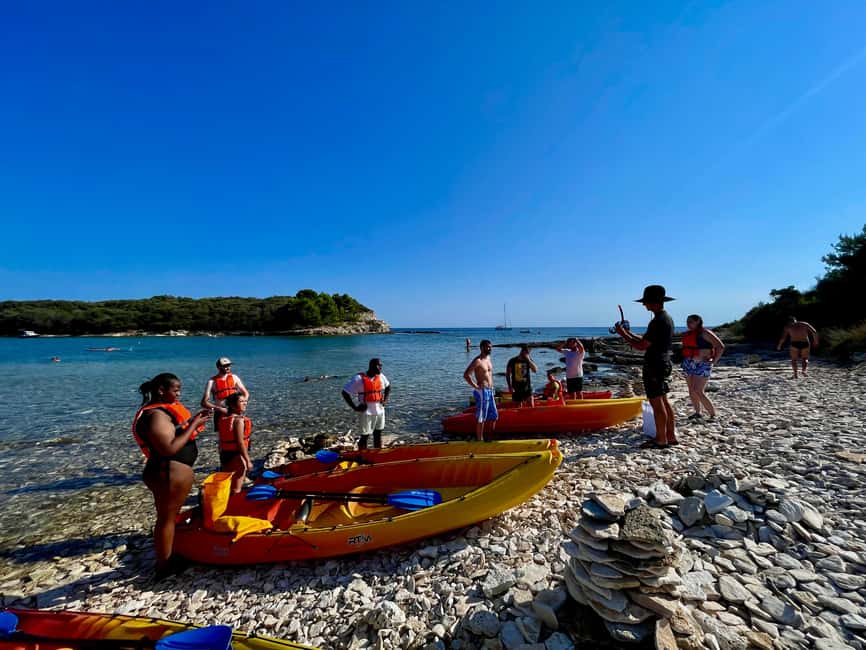Pula: Cave, Canyon and Island Kayak Tour Snorkel&Explore - Entering Grotta di Quarzo by Kayak