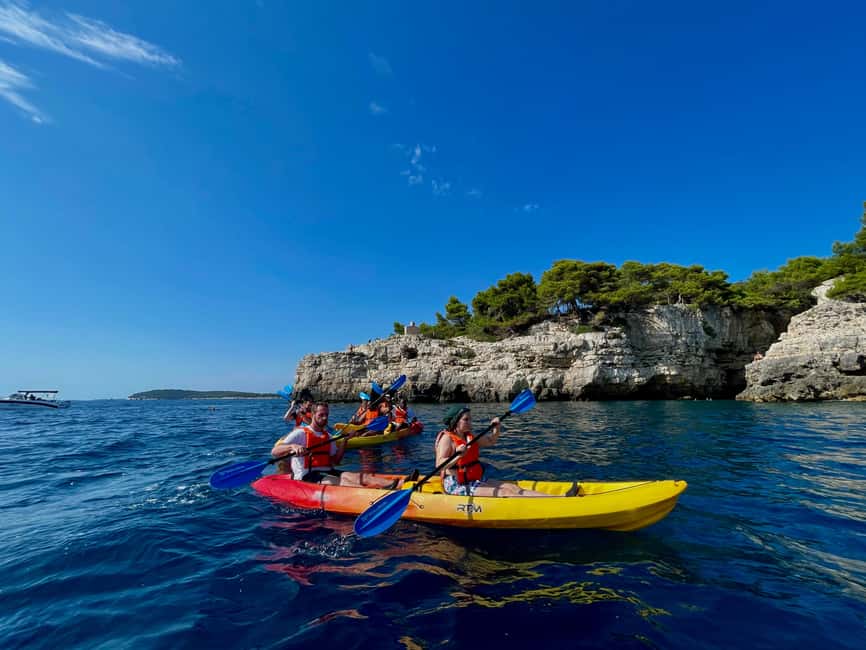 Pula: Cave, Canyon and Island Kayak Tour Snorkel&Explore - Paddling Toward Pula Canyon
